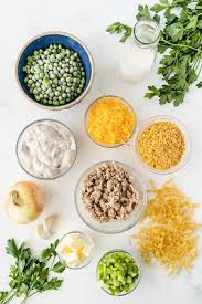 Tuna, cream of mushroom soup, egg noodles, peas, milk. Classic Tuna Noodle Casserole Far From Normal