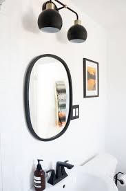 How to inexpensively transform a basic vanity bathroom light into a farmhouse style vanity light i am bound and determined to change up our builder grade basic materials in our home to make it after detaching the builder grade shades and bulbs and my hubby took the fixture off of the wall (i'm a. How To Install A Bathroom Light Fixture Struktr