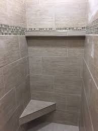 Master Bath Shower In 12x24 Porcelain Tile Installed At A 1 3 Staggered With A Floating Corner Bathroom Remodel Shower Master Bath Shower Bathroom Tub Shower