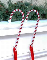 Winnie the pooh w/ candy cane disney noma stocking hanger christmas pooh in box. Haute Decor Candy Cane Stocking Hangers From Haute Decor