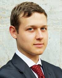 FEDAUX: Leveraging Unlabeled Auxiliary Data in Federated Learning