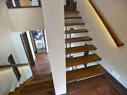 So Many Details Illuminated Handrail Security Rod Beneath Stair Treads Floating Wood Stairs With Invisibl Floating Stairs Stairwell Pictures Stair Lighting