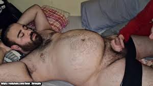 Hairy bear fucks my mouth