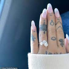 Ariana grande married her fiancé, dalton gomez, in a private ceremony in her courtyard in montecito, california, over the last weekend. Ariana Grande Announces She S Engaged To Dalton Gomez Daily Mail Online