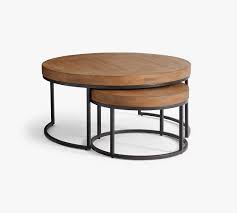 Coffee tables can add structure to the room. Malcolm Round Nesting Coffee Tables Pottery Barn