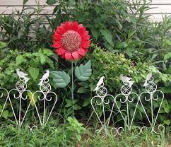 The chain can replace traditional gutter by guiding rainwater. 7 Diy Garden Art Flower Tutorials Empress Of Dirt