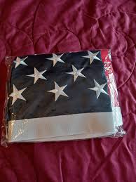 New US flag, and GodBless America flags $10 ea. One Police flag used $5.