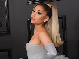Show me a picture of ariana grande. A Complete Guide To Ariana Grande S 55 Known Tattoos