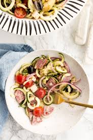 Use a vegetable peeler to make long thin strips of zucchini. Inspiralized Italian Zucchini Pasta Salad