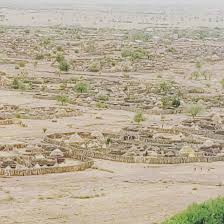 Nakapiramorru Village, Kotido District, North western Uganda, East Africa.  Their main economic activity is cattle keeping. The gorgeous sculptural  forms responding to context. The spatial relationships seen in the village  create social