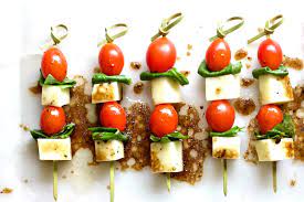 Surprise everyone at your next party with these delicious party finger foods. Caprese Salad Bites Appetizer Recipe Homemade Food Junkie