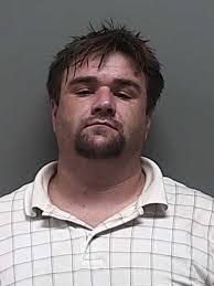 Man held after ATM fire