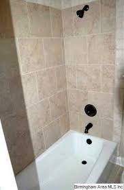 Cast Iron Tub Ceramic Tile Flooring And Shower Surrounds Are Also Featured In The Upstairs Bath Tile Tub Surround Farmhouse Bathroom Accessories Cast Iron Tub