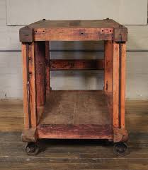 Check spelling or type a new query. Rolling Kitchen Island Table Or Cart Rustic Vintage Wood Metal And Cast Iron At 1stdibs