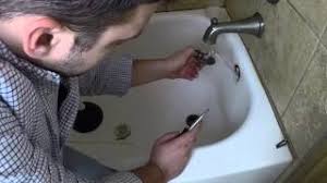 How to unclog a bathtub drain without removing the stopper. How To Snake A Bathtub Drain Rooter Guard