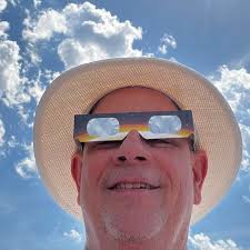 Glue for adhering polymer clay to glass and cured clay