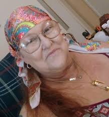 Photo 4) Dr. Roy Litle presented awards to Janice Miller and Victor  Perryman for their essays