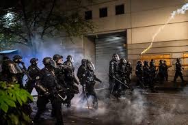Police in portland, oregon, declared a riot saturday night after officers observed protesters damaging multiple businesses, the portland police bureau said in a news release. Violence Tear Gas Feds Portland Is Living In America Trump Future
