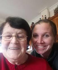 Our grandmother (Ethel Coates) & I straightening-up after Christmas dinner.  (South Bolton)