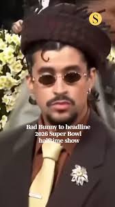 Bad Bunny will bring his Latin trap and reggaeton swagger to the NFL's  biggest stage next year: The Grammy winner will headline the Super Bowl  halftime show. 🎥: AP Photo