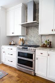 Stone backsplash tiles are the easy way to add a natural element to your walls to create interest and a dramatic and rich hue, charcoal slate is a neutral, dark gray with subtle variations in texture. Considering A Natural Stone Backsplash In The Kitchen Read This First Designed