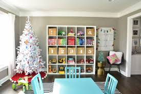 A christmas tree topper can be unique and whimsy, for example, a hat or a pack of candy canes. Our Colorful Whimsical Christmas Decor Kate Decorates