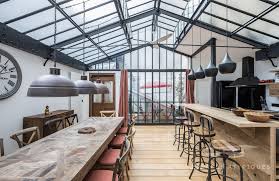 This renovated 1961 apartment brilliantly combines a retro 50s look with an industrial style in a project. An Industrial Parisian Apartment Hits The Market For 2 295m The Spaces