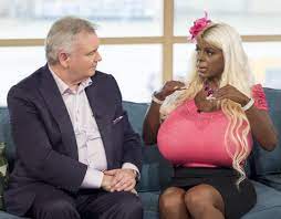 Who is Martina Big? Woman with 32S boobs was born white but used tanning  injections and now identifies as black | The Irish Sun