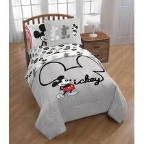 The quilted comforter features everyone's favorite mouse mickey and his best pal pluto dancing down the street with the mickey mouse club house in the distance. Qie E6wqpfv2lm