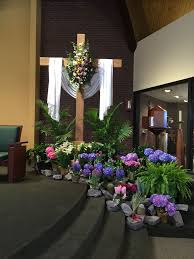 Cut out on cardstock, doves, decorated by the sunday school, with handwritten scriptural verses by the adults, attached to helium balloons (red), symbolic of the tongues. Easter Morning Church Easter Decorations Church Altar Decorations Easter Altar Decorations