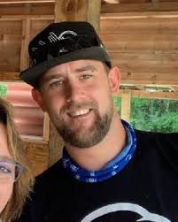 Can you clean up the beach. This is my dad who passed away and I would love  to frame this picture.