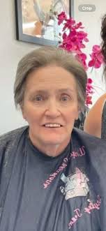 Hi!!! Can someone edit out the people in the background and maybe remove  the jacket off my suitcase? Thank you in advance 😊 Bonus points if you can  edit the board in