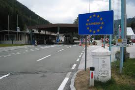 A diesel shunting locomotive propels electric locomotives back to their end of the station. Isolated Austria 238 Border Closures Approved Vindobona Org Vienna International News