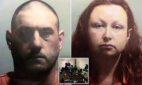 Weapons and ammunition seized from home of school bus drivers in Michigan