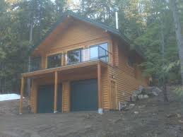 The main level features a vaulted family room and dining area to create an open feel and also includes a small kitchen and a spacious bedroom. Nothing Found For Wp Content Uploads 2011 09 Hillside Garage Plan Jpg Building A Small House Barn Style House Garage House Plans