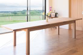 Additional seating is added between the legs! Large 12 14 Seater Oak Extending Dining Table Tallinn Free Delivery Top Furniture