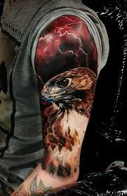 Interesting arm piece with clouds on her upper arm and shoulder, with lightning shooting down her forearm. Colorful Eagle With Lightning Clouds Tattoo On Sleeve