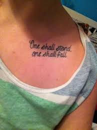One Shall Stand One Shall Fall Transformers Never Give Up Keep Rising To The Challenge Tattoo Collarbone Tattoos Body Is A Temple Tattoo Quotes