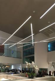 To Break Away From The Monotony Of Standard Office Lighting These Linear Suspensions By Edge Architectural Lighting Design Light Architecture Linear Lighting