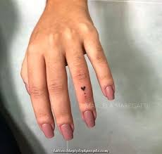 Spectacular Small Coronary Heart Tattoo On Ring Finger Www Otziapp Com Tiny Tattoos For Girls Tiny Heart Tattoos Subtle Tattoos
