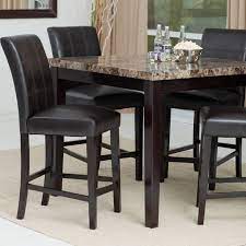 Tuck a round table with a pedestal base into a corner for a snug eating area. Palazzo 5 Piece Counter Height Dining Set Www Hayneedle Com High Dining Table Kitchen Table Settings Dining Room Table Set