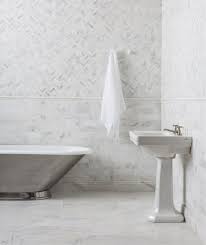 White marble is a fantastic material for bathrooms. Alsace Honed Marble Tile Mandarin Stone