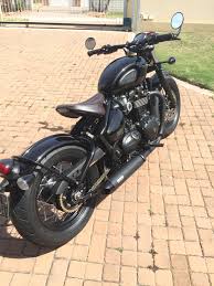 Black And Gold Motorcycle Chain Bobber Black With Gold Chain And Brass Triumph Bikes Triumph Bobber Bobber