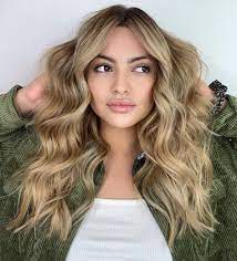 All you have to do is create a part anywhere on the left or right side of your hair. 21 Flattering Middle Part Hairstyles Trending For 2021