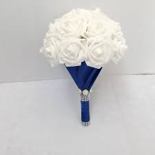 Royal blue and silver wedding bridal bouquet with baby's breath and soft touch. White Rose Bouquet With Royal Blue Ribbon Bridal Wedding Bouquet Vanrina