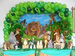 Vine garland adorning the front of the dessert table. Birthday Party Packages In Delhi Ncr Madagascar Party Hello Kitty Theme Party Madagascar Birthday Party