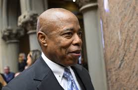 Adams hones strategy as he returns to Albany