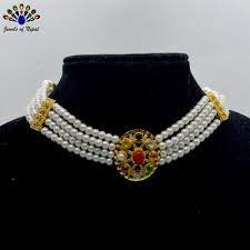 Freshwater cultured pearls, and chain with flat elongated links, this necklace is designed so that you can wear it on the side you want, showing the pearls, the chain, or both. Faux Navratna Embellished Faux Moti Beaded Choker Necklace For Women Online Fancy Jewelry Wholesaler Retailer