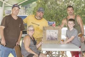 Community members repair Twelve Mile veteran's home