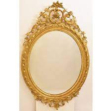 Vintage oval gold framed mirror with streaked silver fading with age on chain h20in/51cm w23.5in/60cm ok condition r262 i have lots of other various items for sale on gumtree. 19th Century Golden Oval Wall Mirror With Gold Leaf Frame For Sale At Pamono
